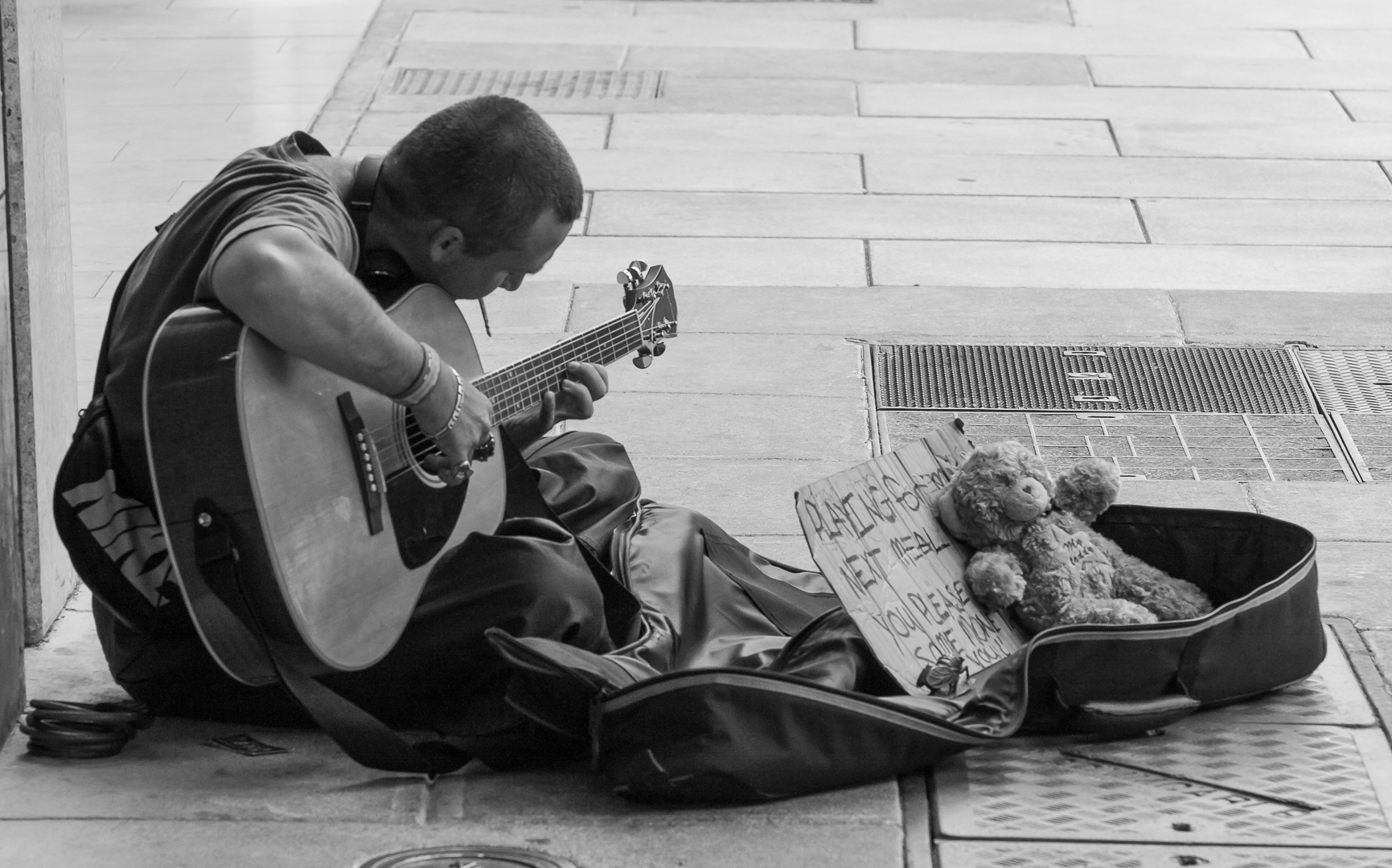 Michael Hind Playing for My Next Meal Highly Commended April 2019   Street Photography